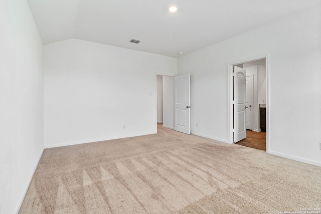 3146 Jackson Smt, Converse, TX 78109 - unfurnished bedroom with carpet, lofted ceiling, and connected bathroom