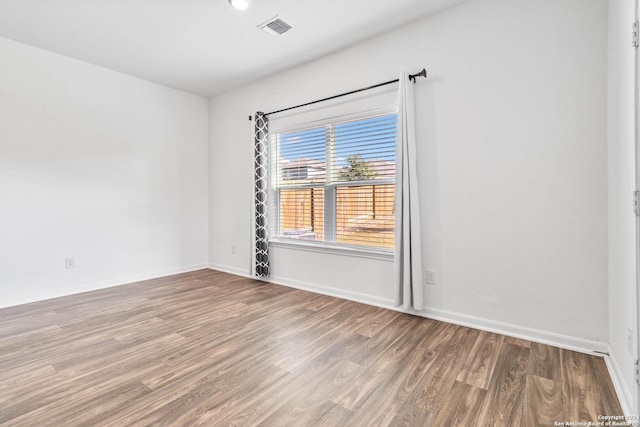 3146 Jackson Smt, Converse, TX 78109 - empty room featuring wood finished floors and baseboards