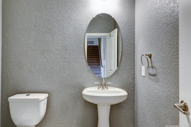 bathroom with sink and toilet