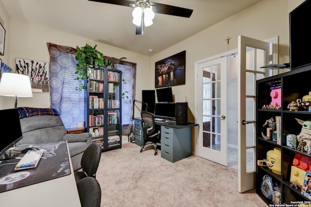 carpeted office space featuring ceiling fan and french doors