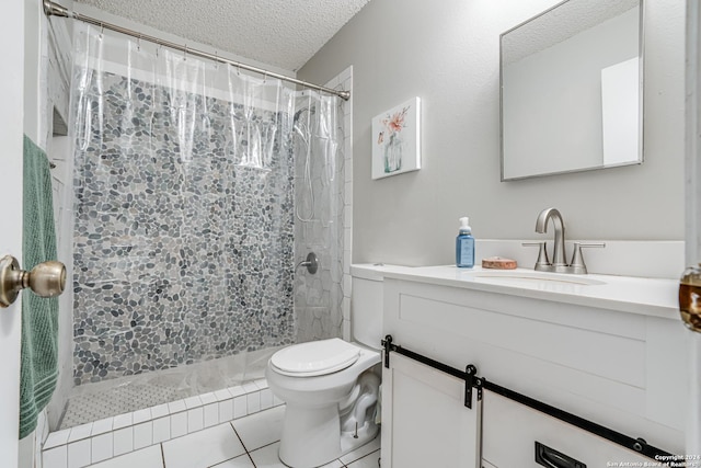 bathroom featuring walk in shower, tile patterned floors, a textured ceiling, toilet, and vanity