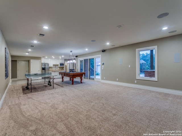 recreation room featuring light colored carpet and billiards