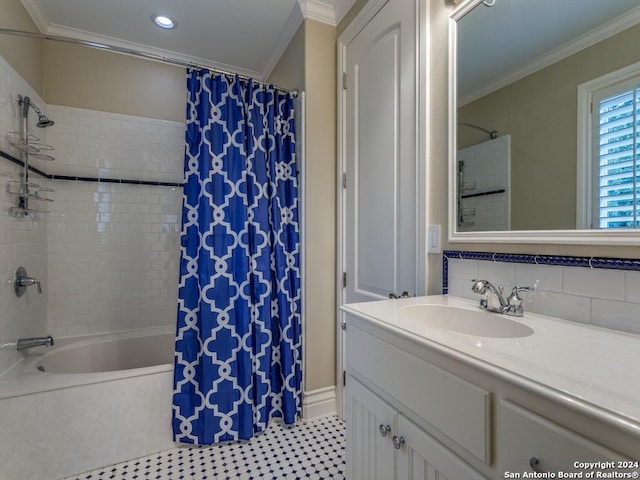 bathroom with tasteful backsplash, crown molding, shower / bath combo with shower curtain, and vanity