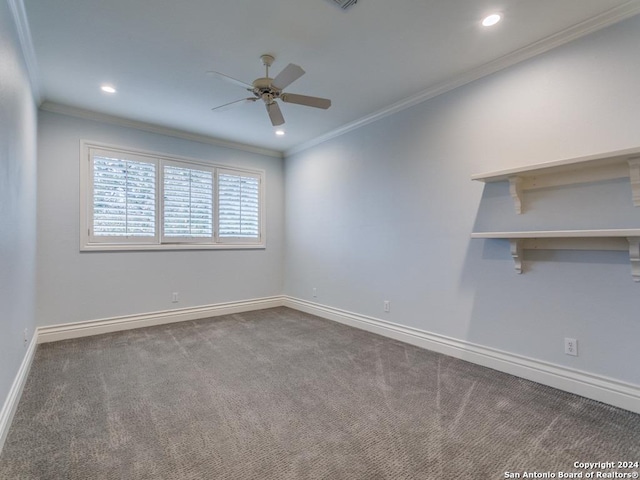 empty room featuring carpet flooring, ceiling fan, and crown molding