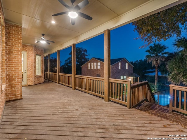 deck at night with ceiling fan