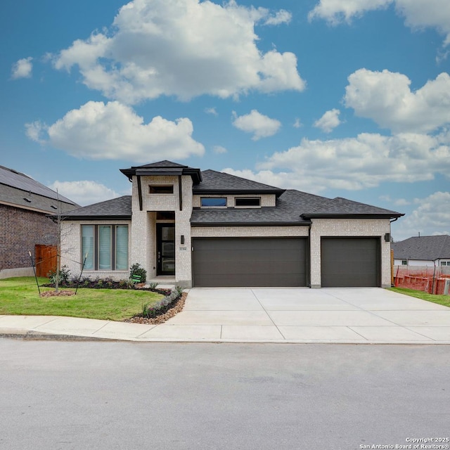 prairie-style house with a garage