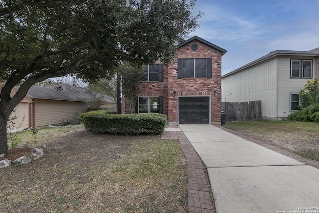 front of property with a garage