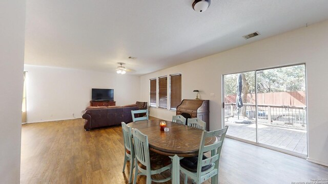 dining space featuring light hardwood / wood-style floors and ceiling fan