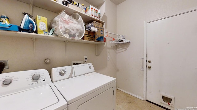 laundry area featuring washing machine and dryer