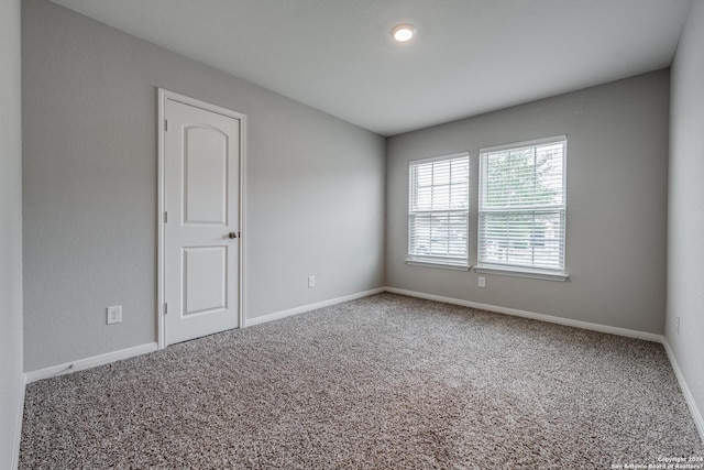 view of carpeted spare room