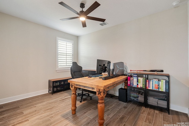 office featuring hardwood / wood-style floors and ceiling fan