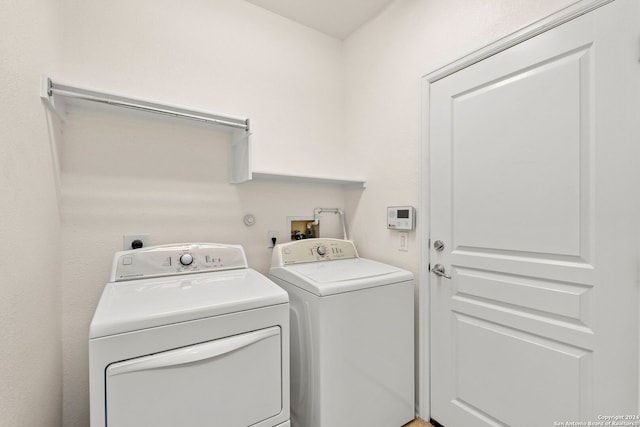 laundry room with washer and dryer