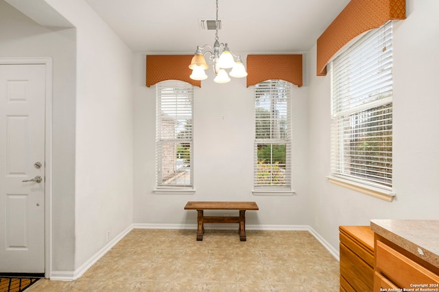 dining room featuring a chandelier