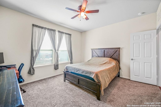 bedroom featuring ceiling fan and carpet flooring