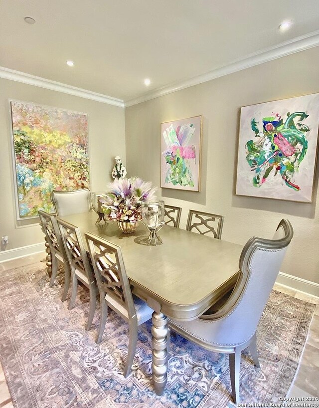 dining area featuring ornamental molding