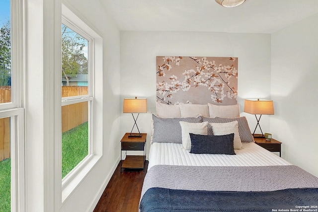 bedroom featuring dark hardwood / wood-style flooring