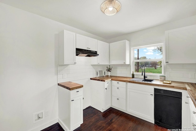 kitchen featuring butcher block countertops, dark hardwood / wood-style flooring, sink, and white cabinets