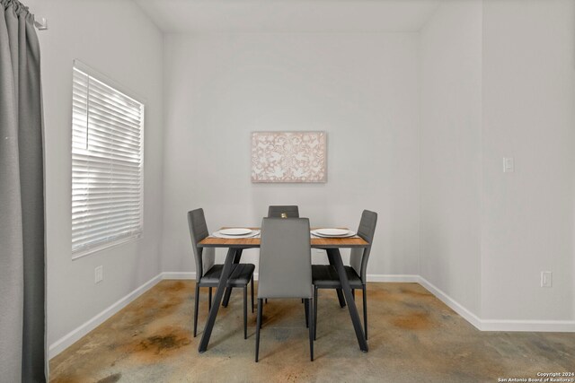 view of carpeted dining space