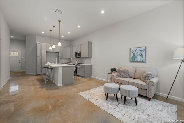 living room featuring sink