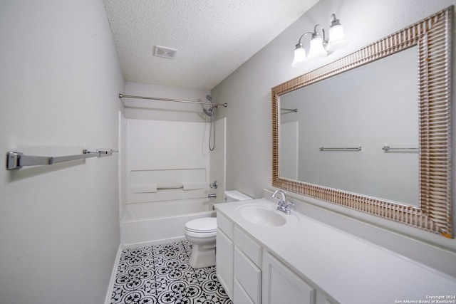 full bathroom with shower / bathtub combination, vanity, a textured ceiling, and toilet