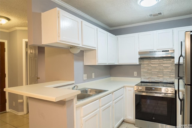 kitchen with kitchen peninsula, stainless steel appliances, white cabinetry, and crown molding