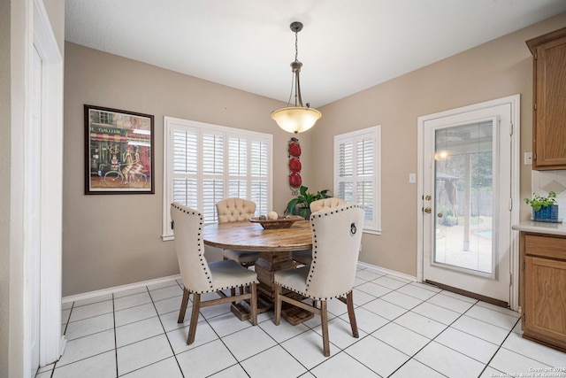 dining space with light tile patterned floors