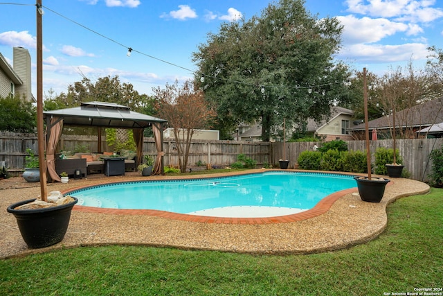 view of swimming pool with a gazebo and an outdoor hangout area