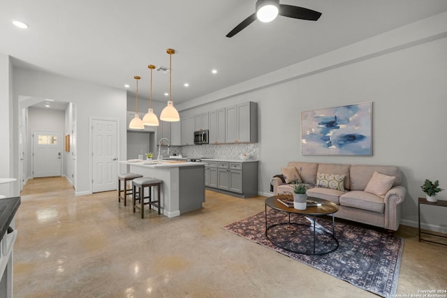1002 Morningside Dr Unit 6, Terrell Hills, TX 78209 - living room featuring finished concrete flooring, a ceiling fan, recessed lighting, and baseboards