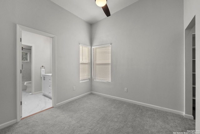 1002 Morningside Dr Unit 6, Terrell Hills, TX 78209 - unfurnished bedroom with ensuite bathroom, ceiling fan, and light carpet