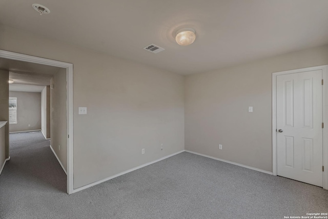 empty room featuring carpet