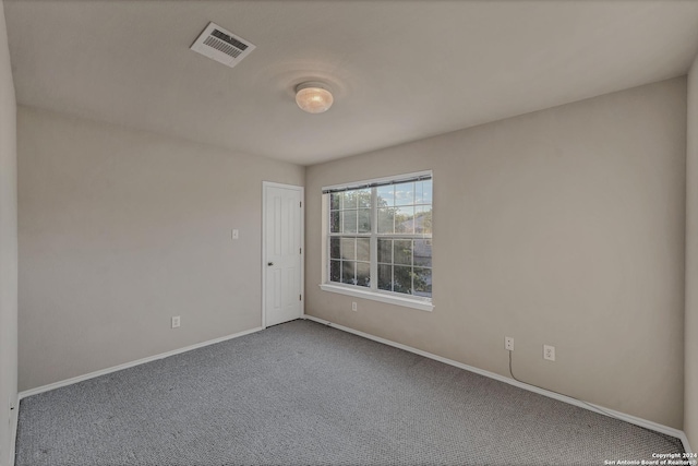 empty room featuring carpet