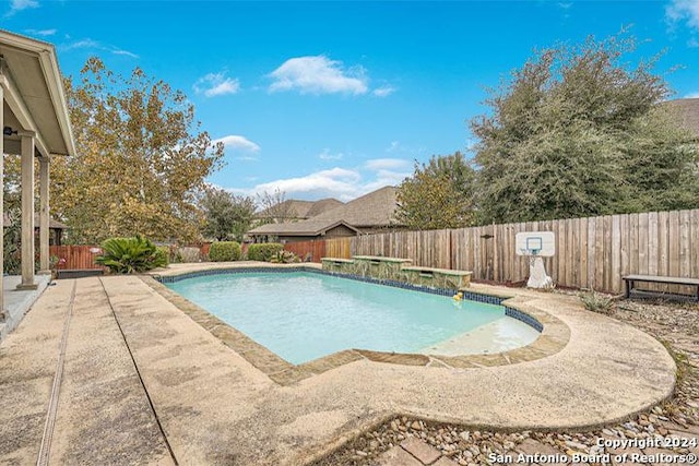 view of pool featuring pool water feature