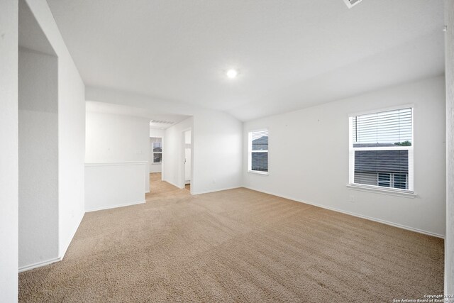 empty room featuring light colored carpet