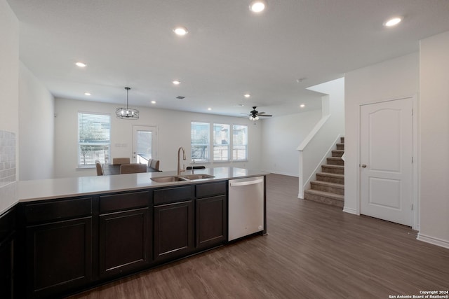 kitchen with a healthy amount of sunlight, dishwasher, sink, and pendant lighting