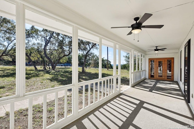 unfurnished sunroom featuring a healthy amount of sunlight