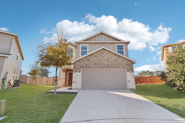 front facade with a front yard, central AC, and a garage