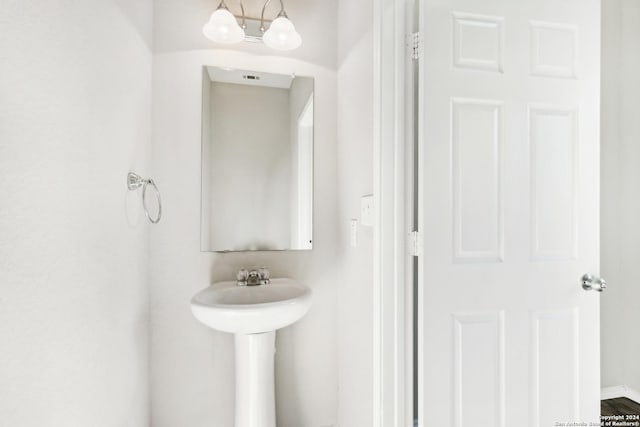 bathroom featuring hardwood / wood-style floors