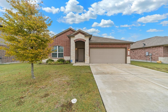 view of front facade featuring a garage and a front lawn