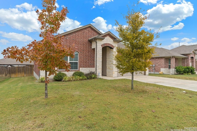 view of front of home with a front lawn