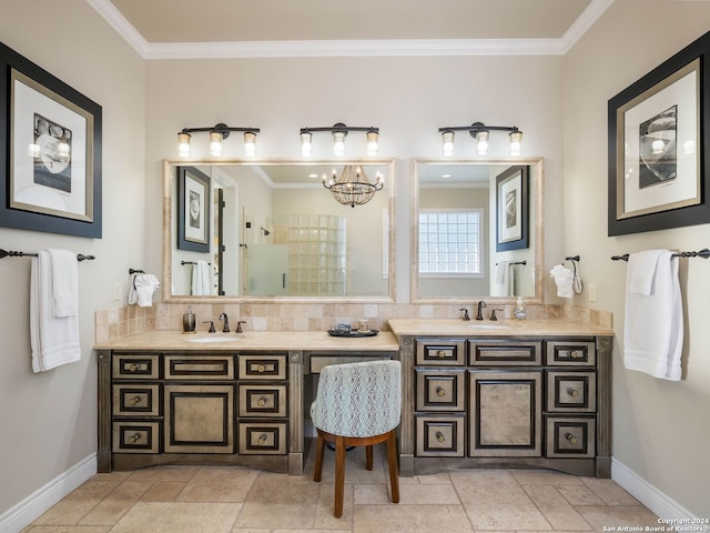 bathroom featuring decorative backsplash, crown molding, and a notable chandelier