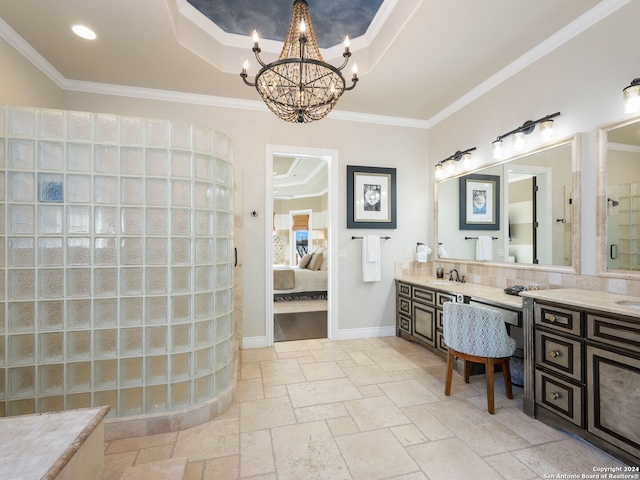 bathroom with vanity, ornamental molding, and a chandelier