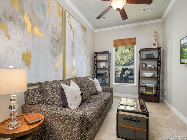 living room with ceiling fan and ornamental molding