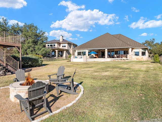 view of yard featuring a gazebo, an outdoor fire pit, and a patio