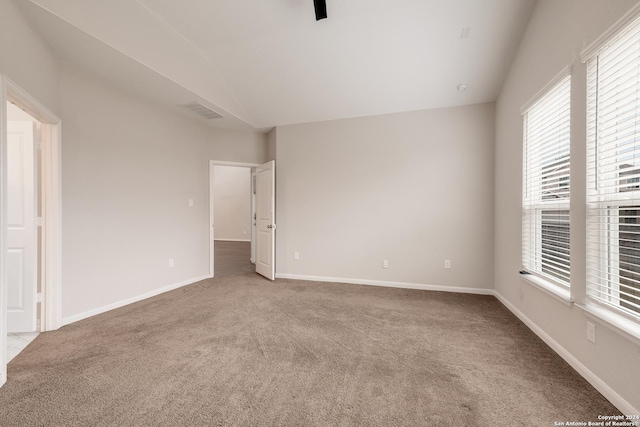 spare room with light carpet