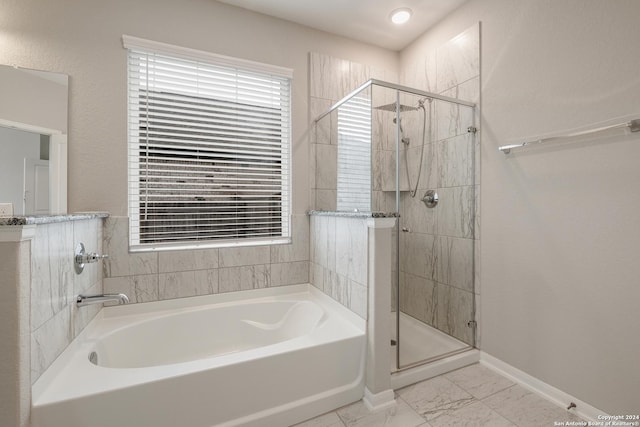 bathroom with independent shower and bath