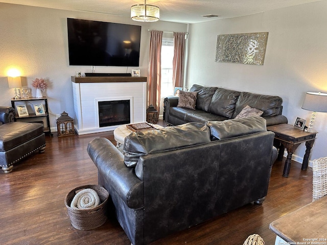 living room with dark hardwood / wood-style flooring