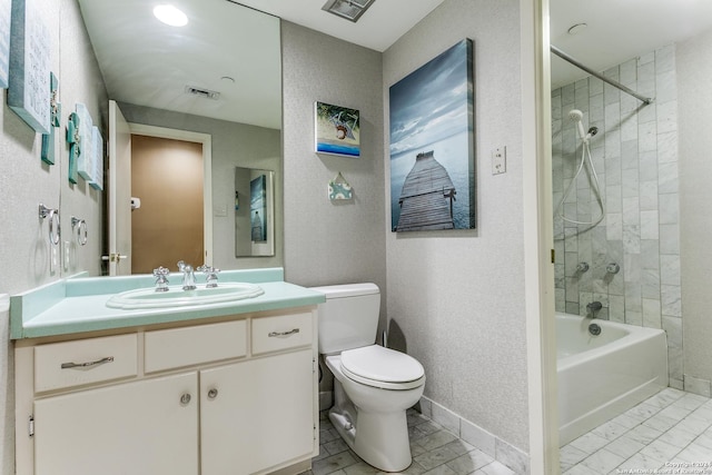 full bathroom with vanity, toilet, and tiled shower / bath combo