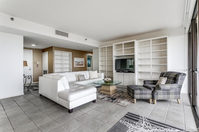 living room featuring tile patterned flooring