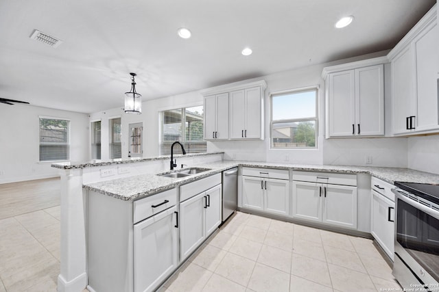 kitchen featuring sink, white cabinetry, and stainless steel appliances