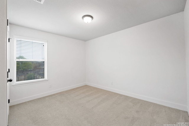 empty room with light carpet